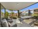 Inviting balcony features comfortable seating, neutral tones, and a view of lush landscaping at 7161 E Rancho Vista Dr # 6002, Scottsdale, AZ 85251