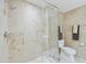 Modern bathroom features a glass-enclosed shower and neutral color palette at 7161 E Rancho Vista Dr # 6002, Scottsdale, AZ 85251