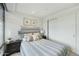 Comfortable bedroom with modern decor, closet, and stylish furnishings at 7161 E Rancho Vista Dr # 6002, Scottsdale, AZ 85251