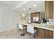 Modern eat-in kitchen with stainless steel appliances and stone countertops at 7161 E Rancho Vista Dr # 6002, Scottsdale, AZ 85251