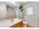 Bathroom featuring gray walls, a wood vanity, tile floors, a shower and a toilet at 8637 E Olla Ave, Mesa, AZ 85212