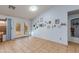 Inviting living room area featuring tile flooring and access to the backyard at 8637 E Olla Ave, Mesa, AZ 85212