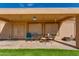 Covered patio with comfortable seating, ideal for outdoor relaxation and entertaining at 8637 E Olla Ave, Mesa, AZ 85212