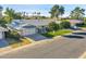 Charming single-story home boasts a well-manicured lawn and a convenient two-car garage at 10825 W Caron Dr, Sun City, AZ 85351
