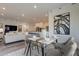 Open-concept dining area, showcasing seamless flow into the living room and kitchen at 11673 N 136Th St # 1013, Scottsdale, AZ 85259
