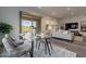 Inviting dining area with a view of the patio and natural surroundings at 11673 N 136Th St # 1013, Scottsdale, AZ 85259