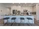 Beautiful modern kitchen with stainless steel appliances, a large island, and white cabinetry at 11673 N 136Th St # 1013, Scottsdale, AZ 85259