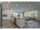 Open concept layout showcases kitchen island, connecting seamlessly to living area at 11673 N 136Th St # 1013, Scottsdale, AZ 85259