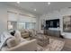 Bright living room with modern decor, large windows, and wood floors at 11673 N 136Th St # 1013, Scottsdale, AZ 85259