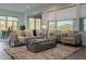 Inviting living room with comfortable seating, a large rug, and plenty of natural light at 11673 N 136Th St # 1013, Scottsdale, AZ 85259