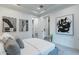 Bright main bedroom showcasing modern decor, plush carpeting, and stylish black and white art at 11673 N 136Th St # 1013, Scottsdale, AZ 85259