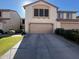 Charming two-story home featuring a two-car garage, landscaped front yard, and well-maintained desert landscaping at 13642 S 42Nd St, Phoenix, AZ 85044