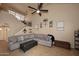 Bright living room with a vaulted ceiling, fan, and a comfortable L-shaped couch for relaxing at 13642 S 42Nd St, Phoenix, AZ 85044