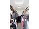 Walk-in closet featuring extensive clothing storage at 13642 S 42Nd St, Phoenix, AZ 85044