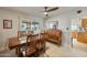 Bright dining room with modern table, stylish decor, and abundant natural light at 1407 E Laguna Dr, Tempe, AZ 85282