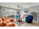 Bright living room with modern furniture, stylish decor, and ample natural light at 1407 E Laguna Dr, Tempe, AZ 85282