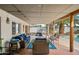 Expansive covered patio area with comfortable seating, perfect for outdoor relaxation and entertaining at 1407 E Laguna Dr, Tempe, AZ 85282