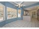 Bright breakfast room with shuttered windows and views to the outside at 14617 W Windcrest Dr, Sun City West, AZ 85375