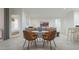 Cozy dining area with modern furnishings, open layout, and seamless flow to living spaces at 15052 W Hackamore Dr, Surprise, AZ 85387