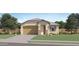 Charming single-story home featuring a desert landscape, a two-car garage, and neutral tones at 15052 W Hackamore Dr, Surprise, AZ 85387