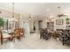 Spacious open-concept dining area next to the formal living space at 15558 W Big Sky Dr, Surprise, AZ 85374