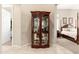 Hallway showing built-in cabinet and view into the main bedroom at 15558 W Big Sky Dr, Surprise, AZ 85374