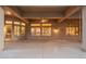 Covered patio with ceiling fan and view of landscaped backyard at 15558 W Big Sky Dr, Surprise, AZ 85374