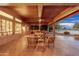 Cozy covered patio featuring comfortable seating and scenic views, perfect for unwinding in the evenings at 15558 W Big Sky Dr, Surprise, AZ 85374