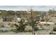 Landscaped walking path and neighborhood homes view from the common area at 16213 W Soft Wind Dr, Surprise, AZ 85387