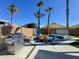 Backyard featuring an outdoor kitchen with stainless steel grill, patio furniture, and hot tub at 17311 N Kimberly Way, Surprise, AZ 85374