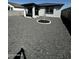 Low-maintenance backyard with modern stone, perfect for outdoor living and relaxation at 18231 W Paraiso Dr, Surprise, AZ 85387