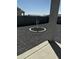 This modern backyard features desert stone and privacy walls for a serene and stylish outdoor living space at 18231 W Paraiso Dr, Surprise, AZ 85387