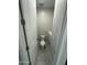 A half-bathroom features a tile floor, toilet, and white walls at 18231 W Paraiso Dr, Surprise, AZ 85387