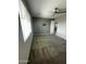 Spacious bedroom with a ceiling fan and large window letting in plenty of natural light at 18231 W Paraiso Dr, Surprise, AZ 85387