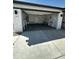 Spacious two-car garage with ample storage and a well-lit interior, perfect for organization and convenience at 18231 W Paraiso Dr, Surprise, AZ 85387
