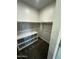 A walk-in closet features built-in shelving for organization at 18231 W Paraiso Dr, Surprise, AZ 85387