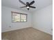 Bedroom with a ceiling fan and a window with blinds at 18835 N Palomar Dr, Sun City West, AZ 85375