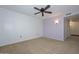 Empty bedroom with carpet floors and a ceiling fan at 18835 N Palomar Dr, Sun City West, AZ 85375