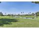 Scenic golf course view with manicured greens and clear blue sky at 18835 N Palomar Dr, Sun City West, AZ 85375