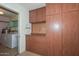 Storage with laundry hook ups and floor to ceiling cabinets at 18835 N Palomar Dr, Sun City West, AZ 85375
