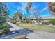 Picturesque street view showcasing well-maintained lawns and attractive homes at 18835 N Palomar Dr, Sun City West, AZ 85375