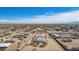 Wide aerial view showing a residential community featuring various homes and plots of land in a rural setting at 2038 S 221St Ave, Buckeye, AZ 85326