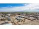 Wide angle aerial view of properties in a rural area with mountain views in the distance at 2038 S 221St Ave, Buckeye, AZ 85326