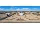 Aerial view of a property with expansive grounds and a detached two car garage at 2038 S 221St Ave, Buckeye, AZ 85326
