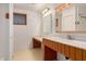 Bathroom features a white sink, vanity and large countertop space at 2038 S 221St Ave, Buckeye, AZ 85326