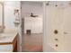 Bathroom view with bathtub and shower, looking out to an airy room at 2038 S 221St Ave, Buckeye, AZ 85326