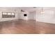 Living room featuring modern wood flooring, neutral walls, and lots of space at 2038 S 221St Ave, Buckeye, AZ 85326