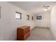 Spacious room with multiple windows and ceiling fan, ready for customization at 2038 S 221St Ave, Buckeye, AZ 85326