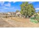 Expansive backyard with desert landscaping, hardscape patio, and lush garden at 2213 E Constance Way, Phoenix, AZ 85042