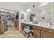 Bathroom featuring a large mirror, double sinks, and an expansive walk-in closet at 2213 E Constance Way, Phoenix, AZ 85042